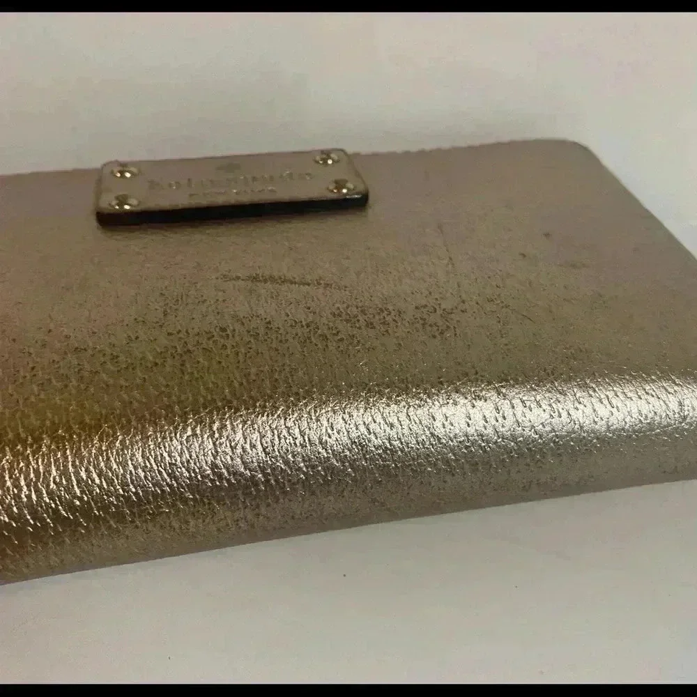 Kate spade metallic bronze leather wallet
